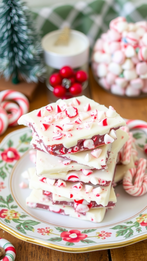 A stack of peppermint bark on a decorative plate, surrounded by festive holiday treats.