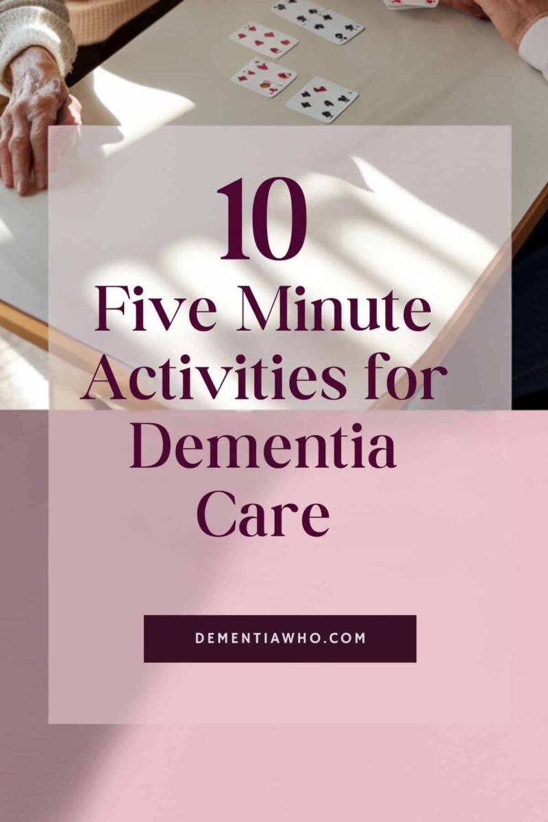 an elderly person and caregiver sitting together at a well-lit table, engaging in a simple memory game with playing cards, capture from a gentle overhead angle., overlayed with a semi-transparent white box in the center containing the bold title '10 Five-Minute Activities for Dementia Care'